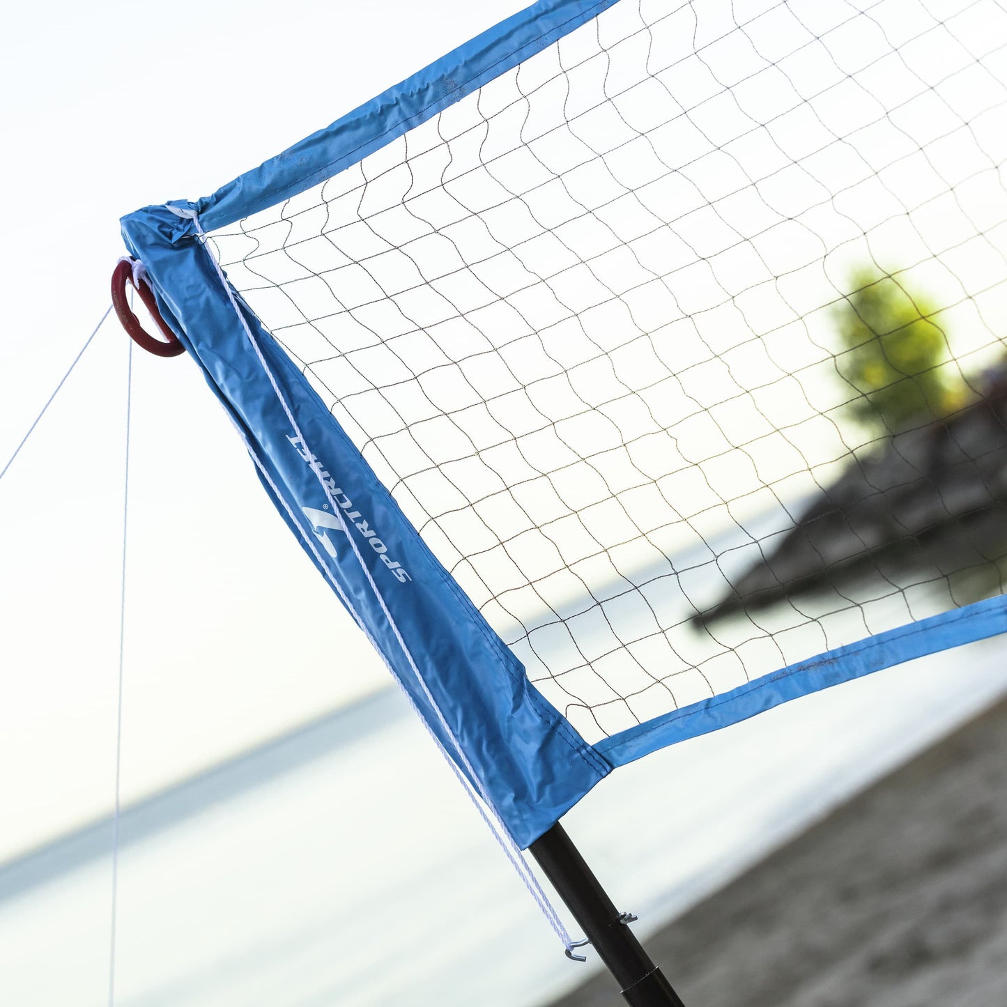 Sportcraft Badminton Volley Ball Set - Lifestyle Image - Volley Ball net close up on beach