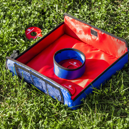 Sportcraft Washer Toss Portable game Lifestyle Image, Product sitting on grass with washers close to it