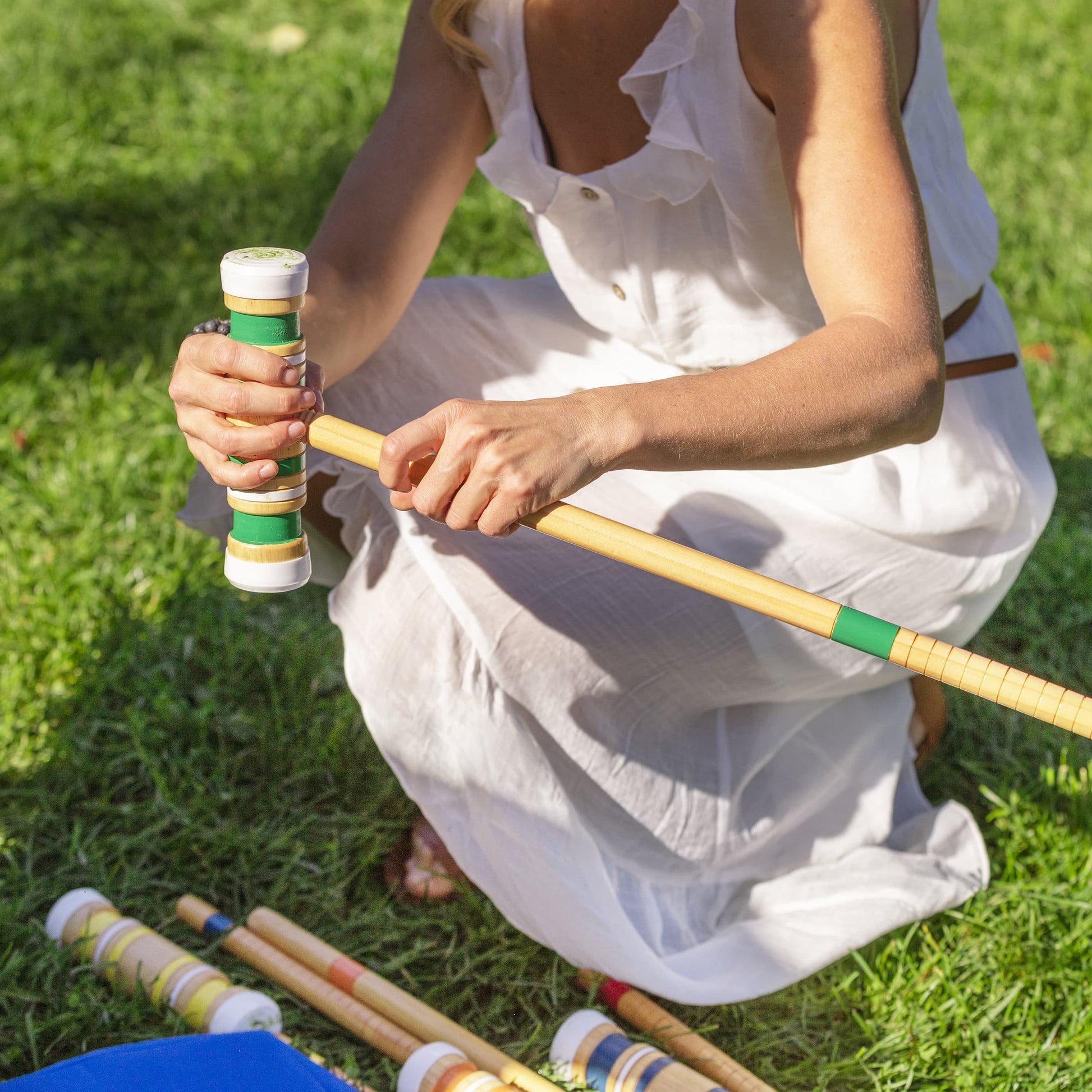 Sportcraft Croquet Set Lifestyle Image, Woman putting Croquet Set together for play