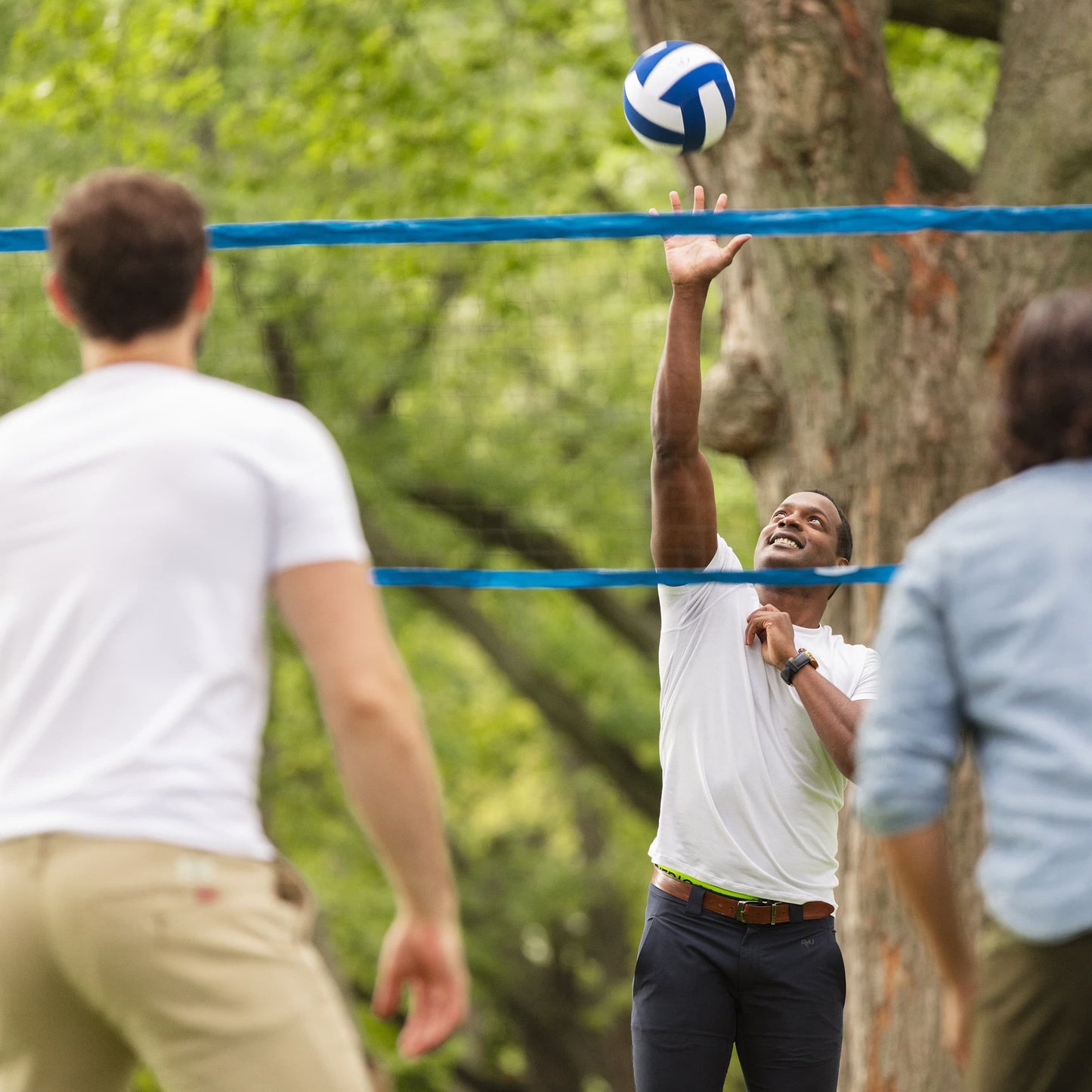 Sportcraft Badminton Volley Ball Set  - Lifestyle Image - Men playing Volley Ball in a park