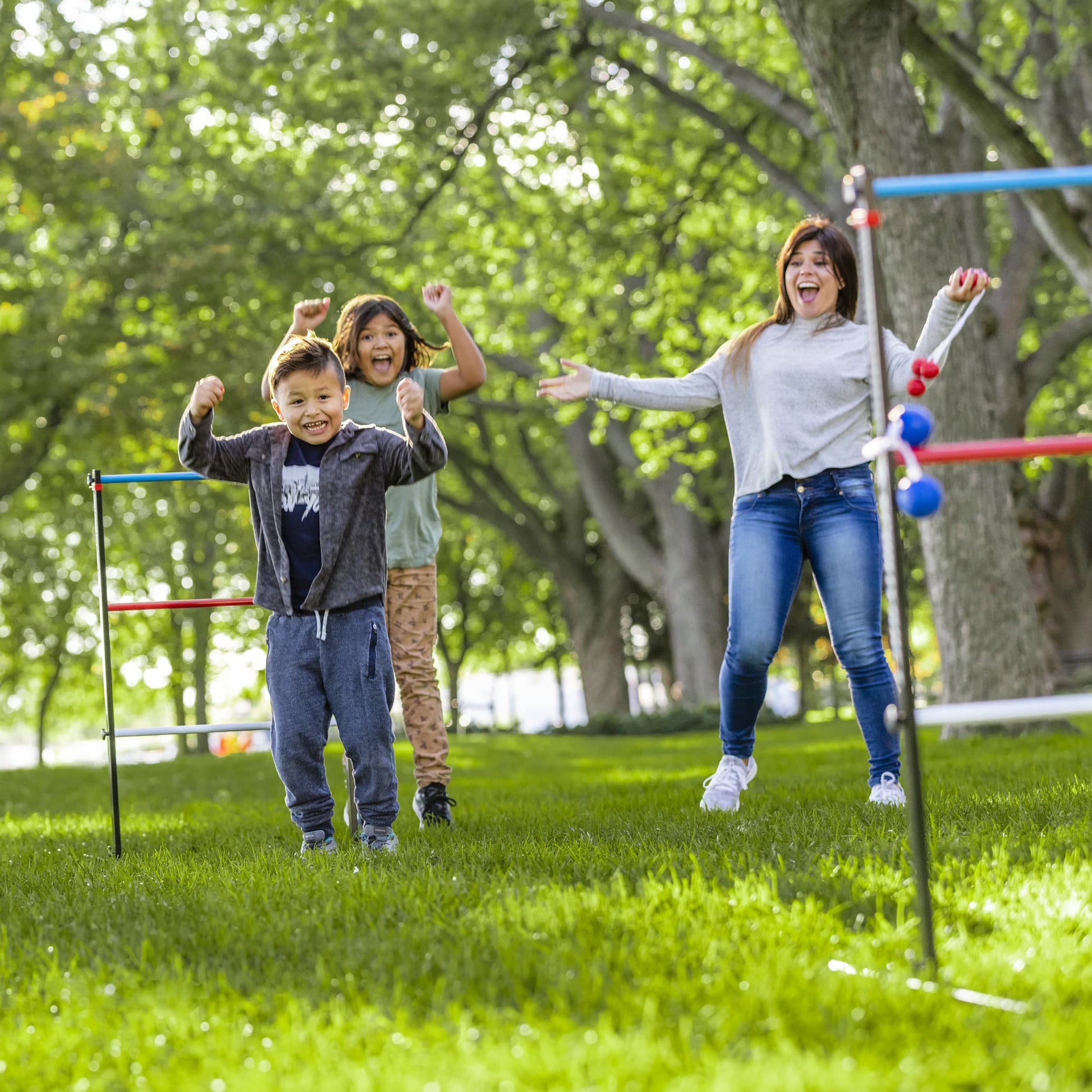 Sportcraft Steel Ladder Toss Lifestyle Image, Young family playing game in a park